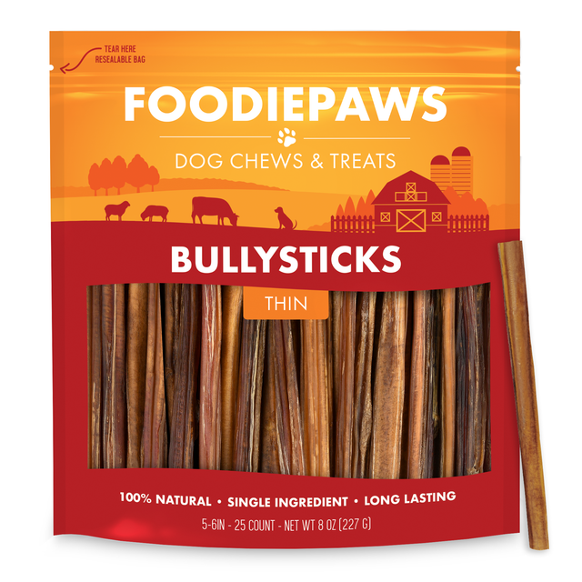 A resealable Foodiepaws bag of 5-6 inch thin bully sticks with a single slim dried beef stick standing alongside it